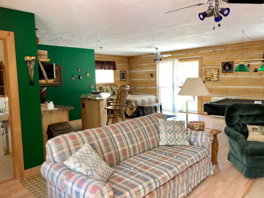 Sofa bed is a queen size. Full size pool table, island counter in kitchen.
