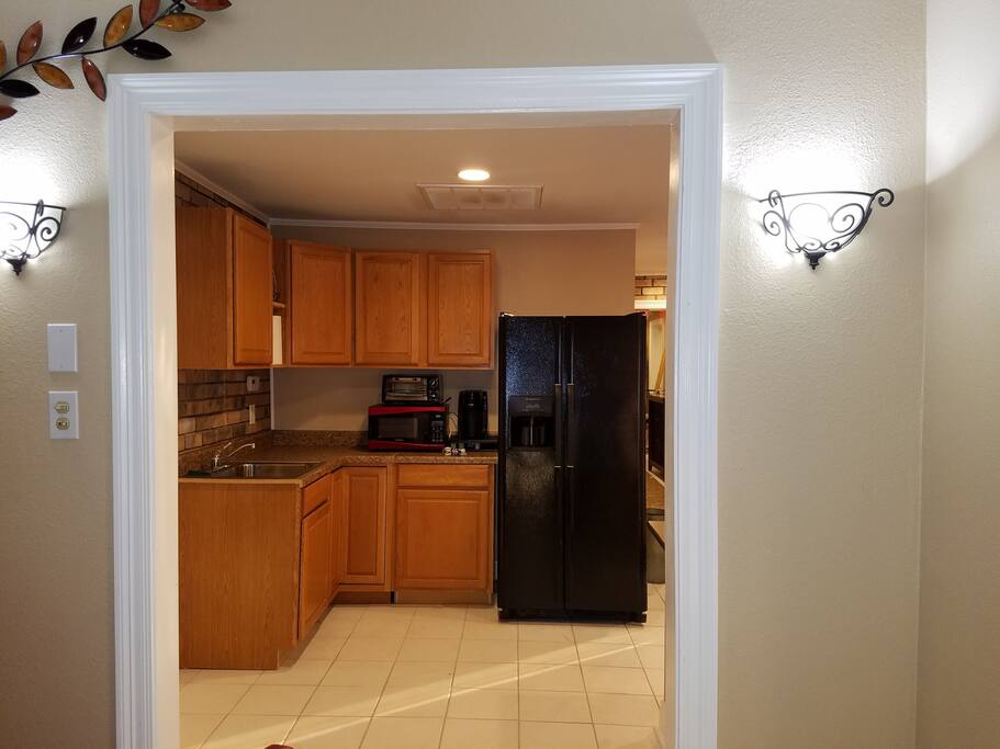 kitchenette with full fridge