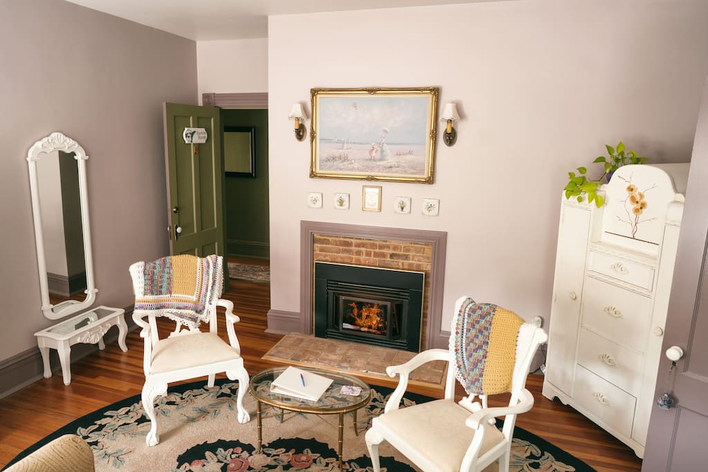 Easton Room - Seating Area with Working Fireplace and Antique Hand Painted Wardrobe