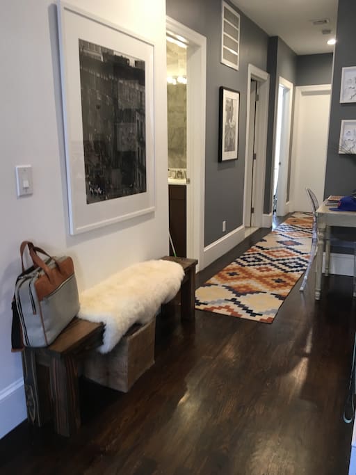 Long hallway entrance, 2 bathrooms and 2 bedrooms.