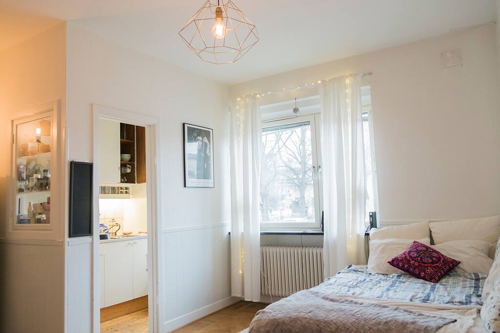 Bed and kitchen