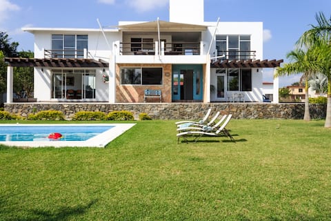 Turquoise estate on the banks of the river.