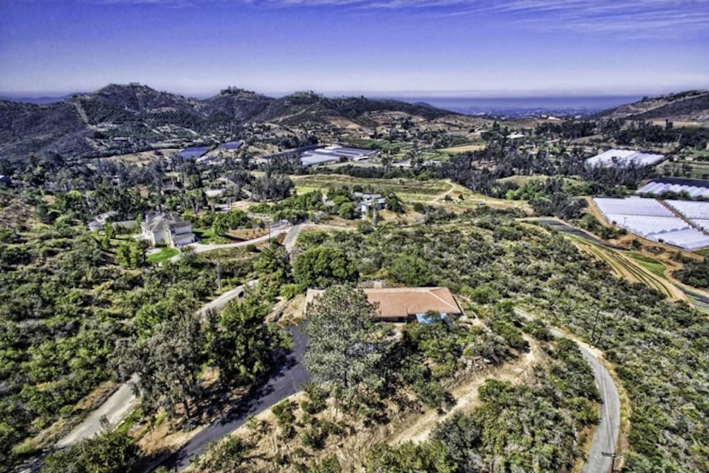 Arial view of property and surroundings
