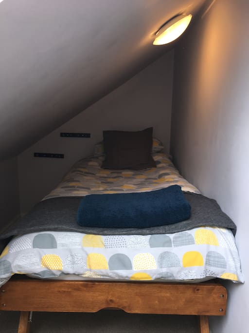 Second bed for twin room.