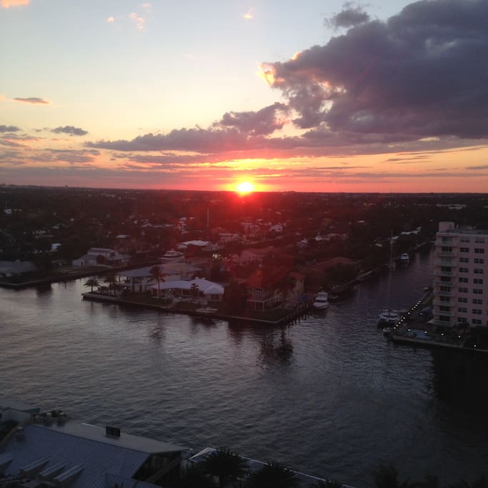 a glass of wine and the beautiful sunset every night