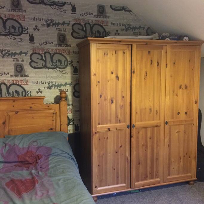 Double wardrobe- with hangers and shelving.