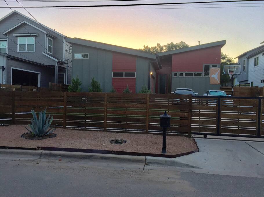 Modern home surrounded by newly built homes