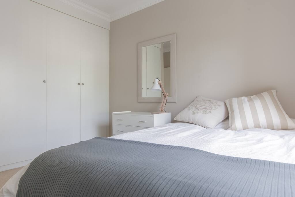 Full length mirror is available on the back of the bedroom door.