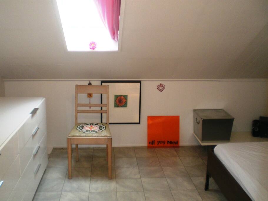 cosy bedroom with roof window