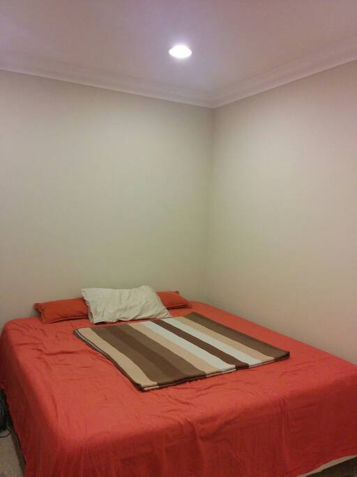 Private Bedroom with Queen Bed.