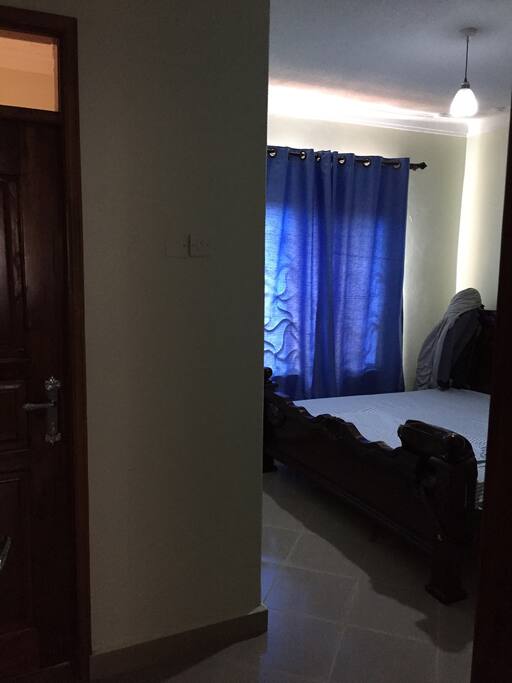 Bedroom with a 6*6 comfortable bed.