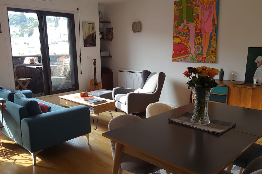 Living-room with dining table.