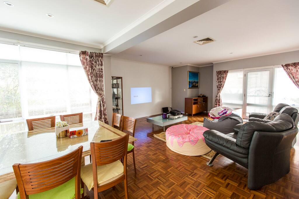 Common living room with projector to link to your OWN laptop. Stream movies with our wifi!
