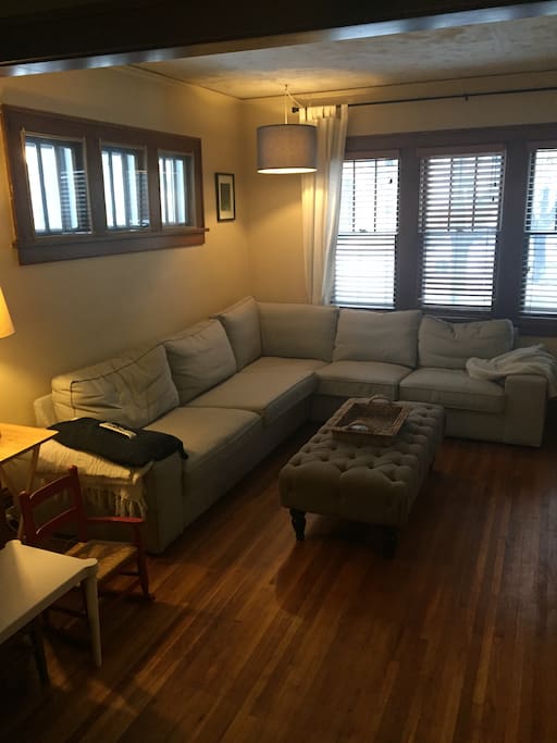 This is the living room. This sectional can sleep two.