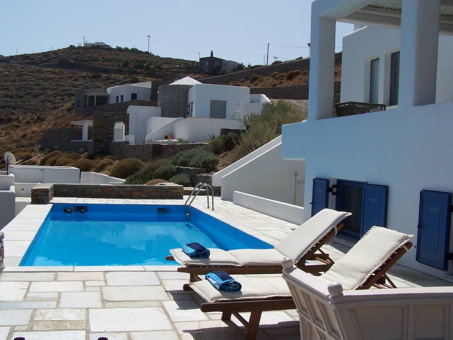 Pool Area With Sunbeds