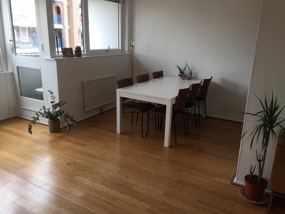 open plan dining area and small covered balcony. the balcony is perfect to look out while having your morning coffee. Balcony also ideal for smokers (no smoking inside). can also extend table if you want a huge dinner.