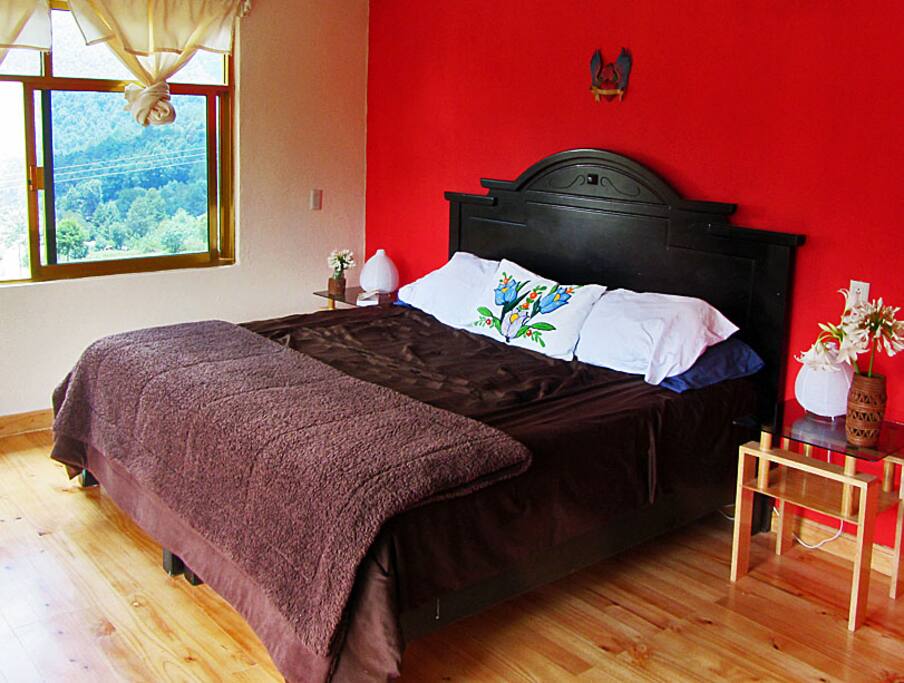 We have three red rooms, 2 with kingsize beds, one with double, all with great views of the mountains.