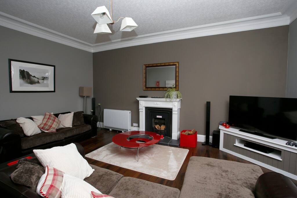 Living room with 55inch smart TV and blue-ray dvd player and surround sound system