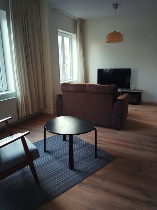living room with huge TV