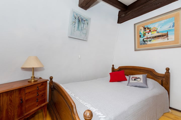 bedroom on the second floor of the windmill