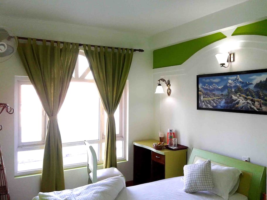 Room No.104 with back city and mountain view