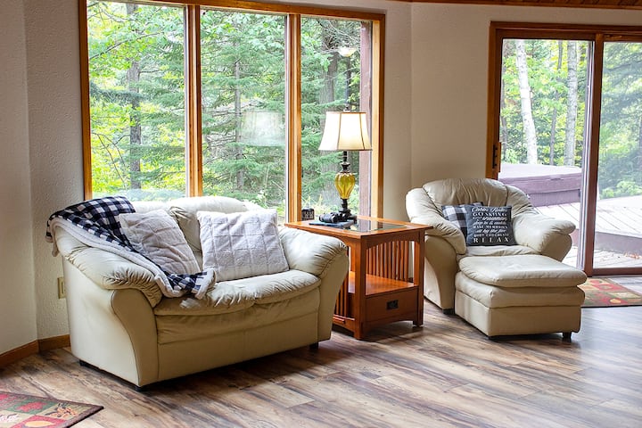 Beautiful main living room and lots of windows with a great lake view!