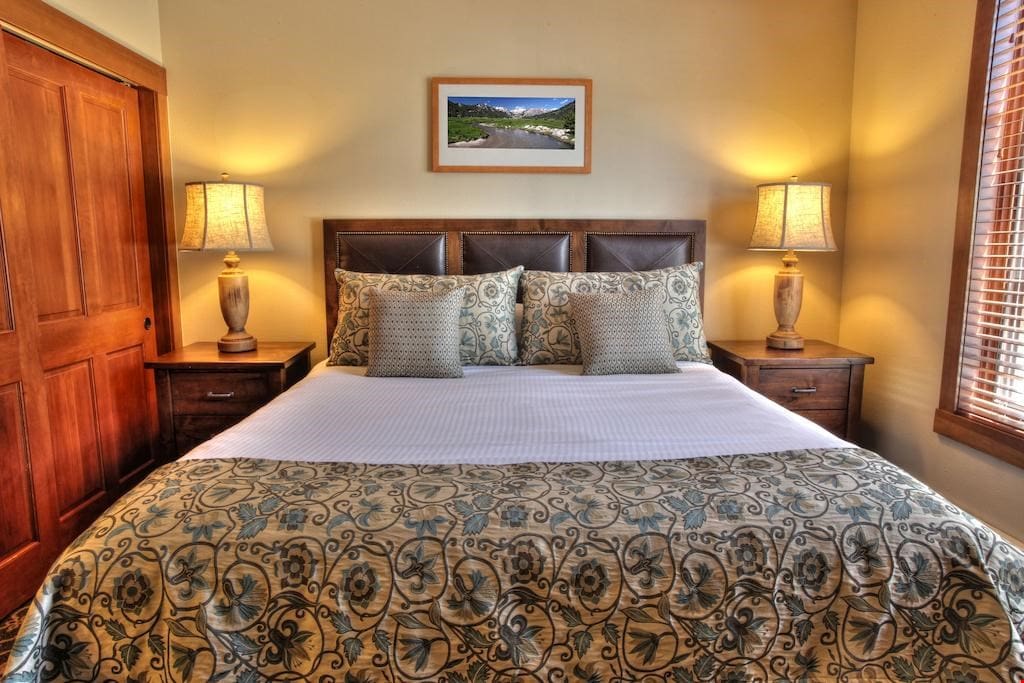 The master bedroom has a luxurious king-sized bed.