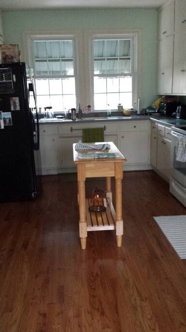 Large furnished kitchen with two sinks, breakfast room seating, AND large adjoining dining room which seats 14 people.