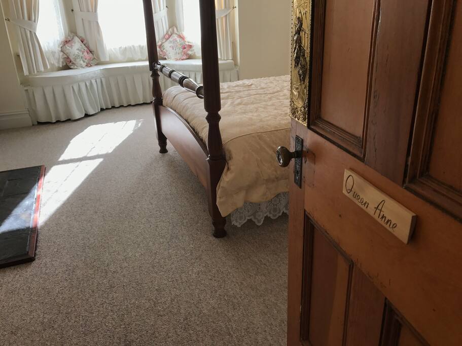large bedroom with window seat