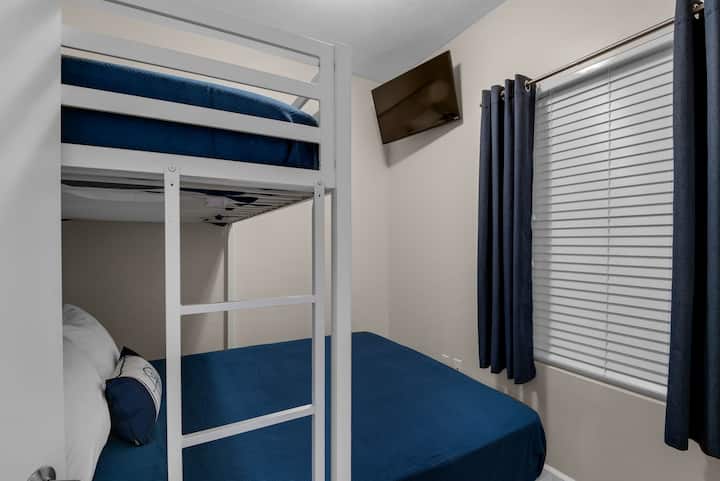 Small 2nd bedroom - lofted twin bed and a queen bed