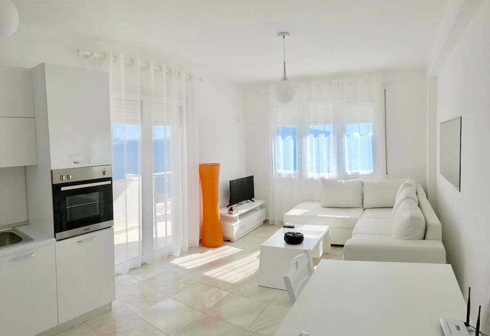 living area with sea view, smart tv, air condition, wifi, and 2 sofa beds