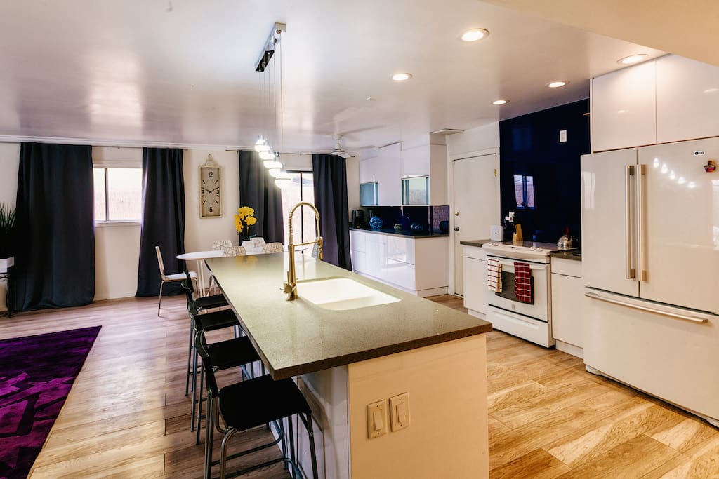 Central countertop with bar seating.