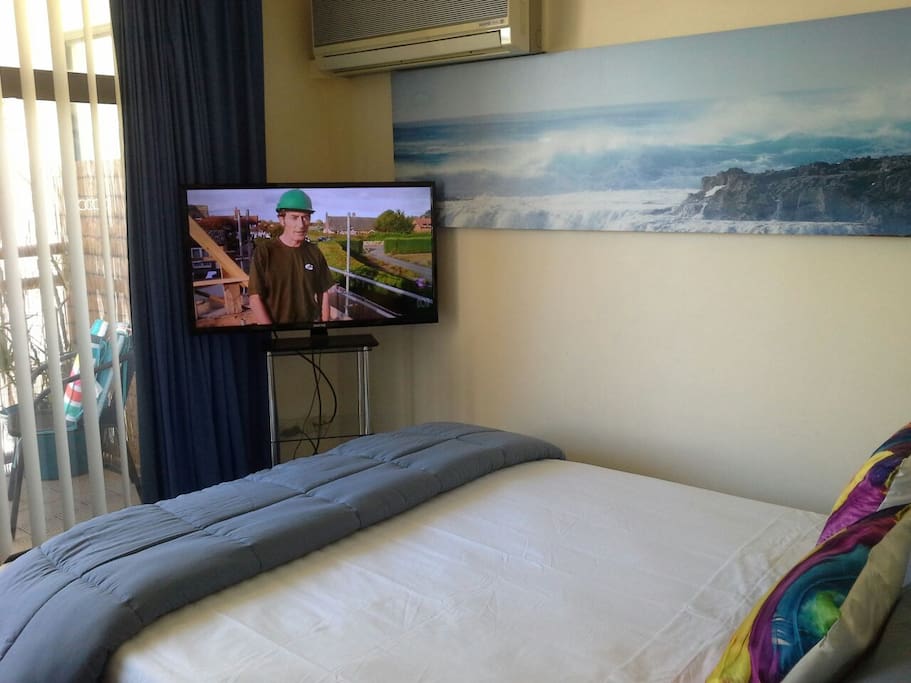 Queen size bed, 42 inch flat screen TV