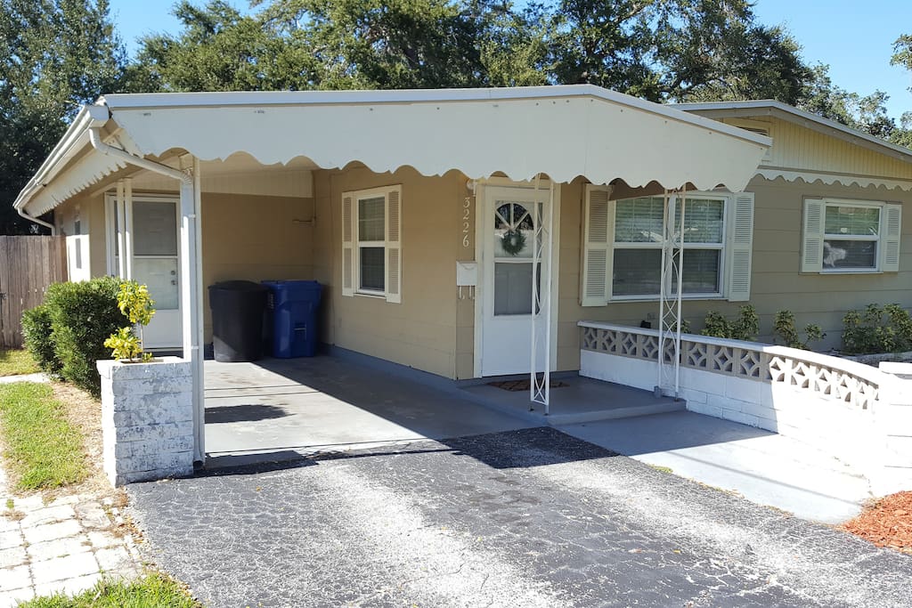 Pull in to your private drive complete with covered carport and 2 entryways