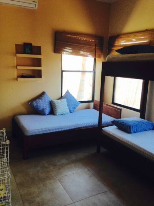 The second bedroom offers beds for up to 3 guests.