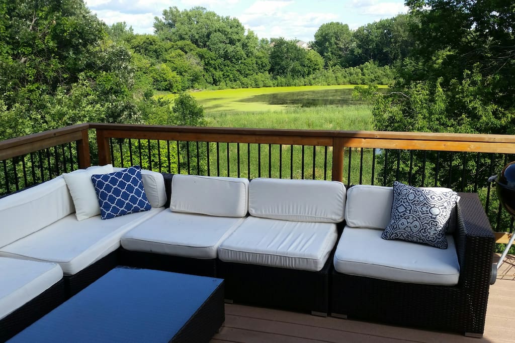Backyard deck w/ fire table overlooking Lake Riley and protected wetlands
