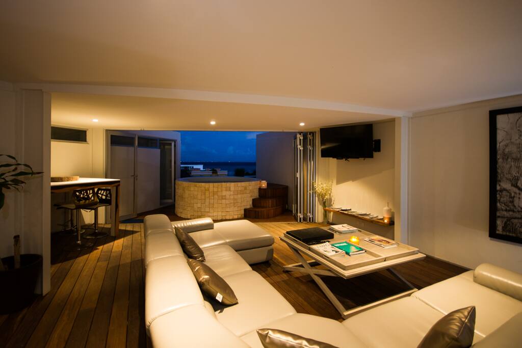 Indoor Outdoor Living Area at night