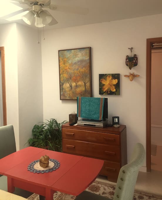 flat screen tv across from bed