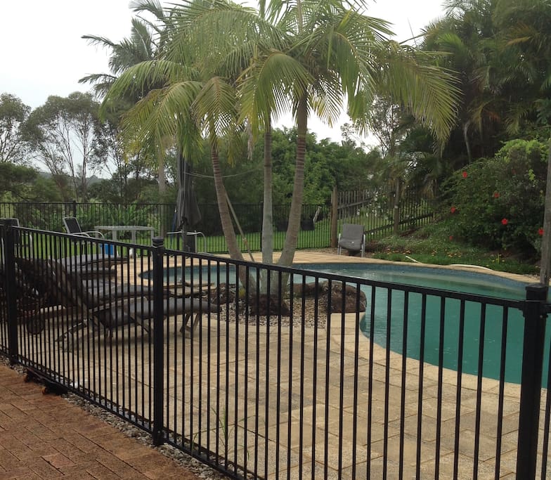Sparkling inground pool, Sunbeds for lounging around