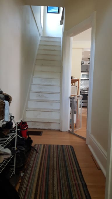Front entrance and stair leading to bedrooms upstairs