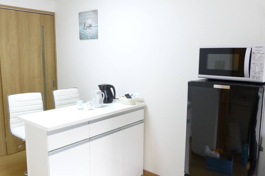 counter table, refrigerator, micro wave in Dining room