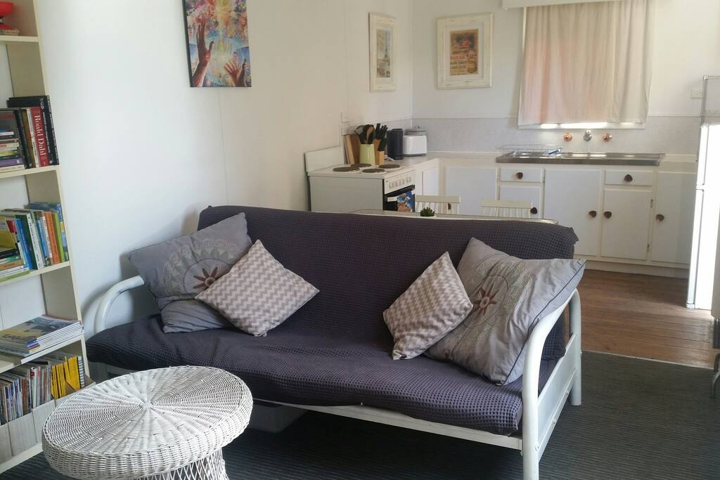 Sun-filled lounge room with Futon sofa double bed for extra guests or children
