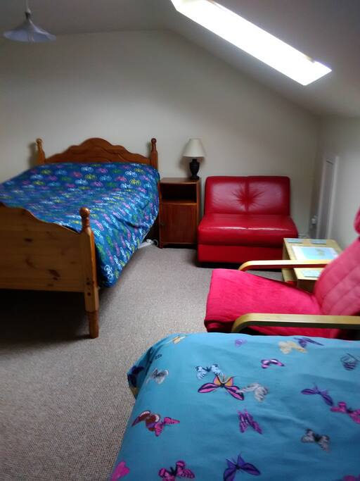 double and a single bed on Ist floor near to a toilet