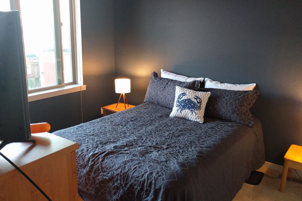 California king bed in master bedroom - with views of the city and Mount Rainier!