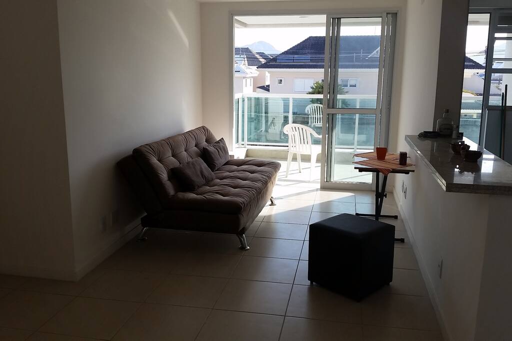 Sala com sofá cama