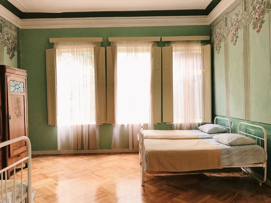 bedrooms have wooden shuttered windows.