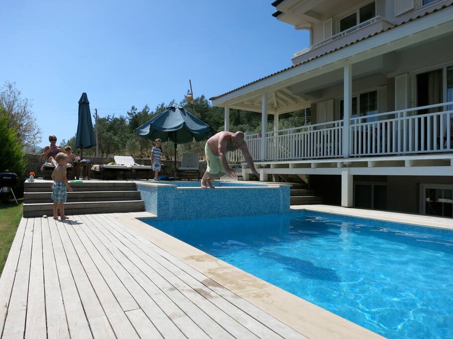 Decking around the pool and private Garden