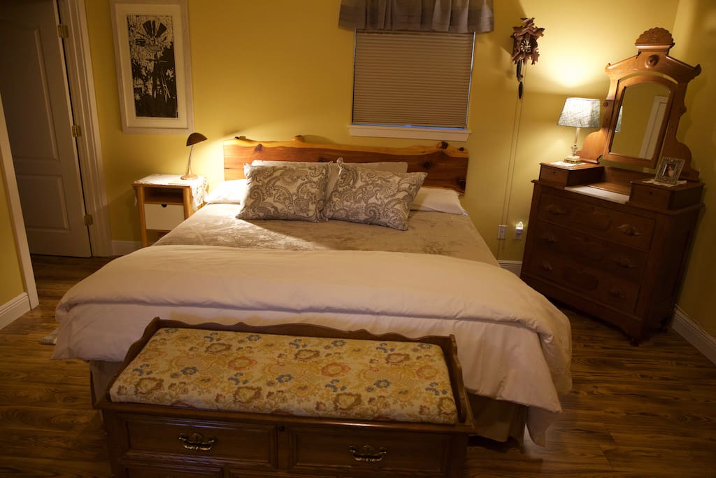 King-sized bed with cedar headboard
