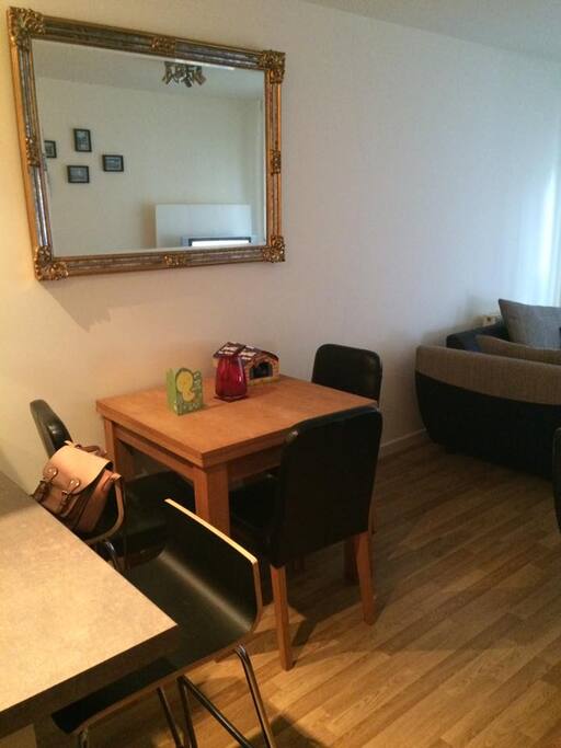 Extendable dining table in open plan kitchen, dining, living space.