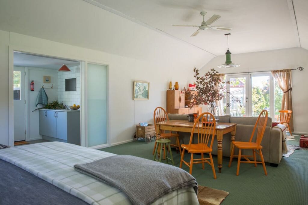 large studio - french doors opening to outside courtyard